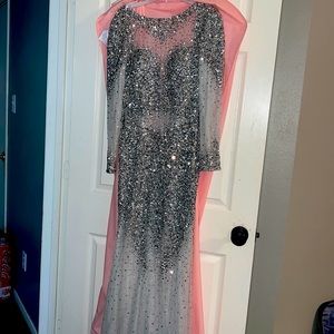 Stunning 1 of a Kind sheer shimmering custom evening gown.